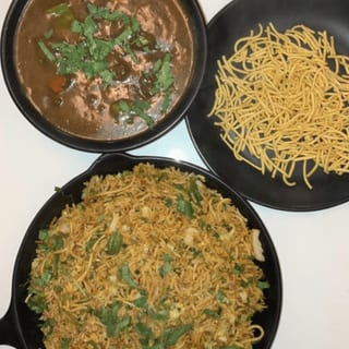 Triple Schezwan Fried Rice (Includes Veg Manchurian Gravy)